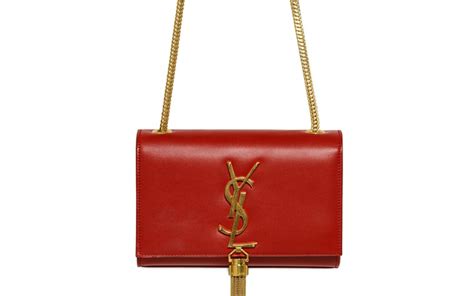 red ysl bag with tassel.